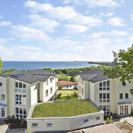 Terrasse, gratis Nutzung vom AHOI Erlebnisbad und Sauna in Sellin - Meeresblick FeWo 43 Apartment